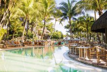 Het zwembad van Canonnier Beachcomber Golf Resort & Spa heeft een apart kinderbad